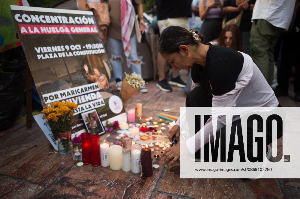Protest in memory of Maricarmen in Malaga - 09 Oct 2026 A protester is seen lighting a candle next to a picture of Maricarmen as a tribute during a protest and a minute of silence in memory of Maricarmen Abascal, the 87-year-old woman who was evicted of her house and died in hospital a few days later. Thousands of people demand decent housing and to continue with the legacy of Maricarmen Abascal. Spain’s housing crisis has forced people to take to the streets, urging the Spanish government to take action and implement effective policies to regulate housing prices and protect vulnerable people. Malaga Spain