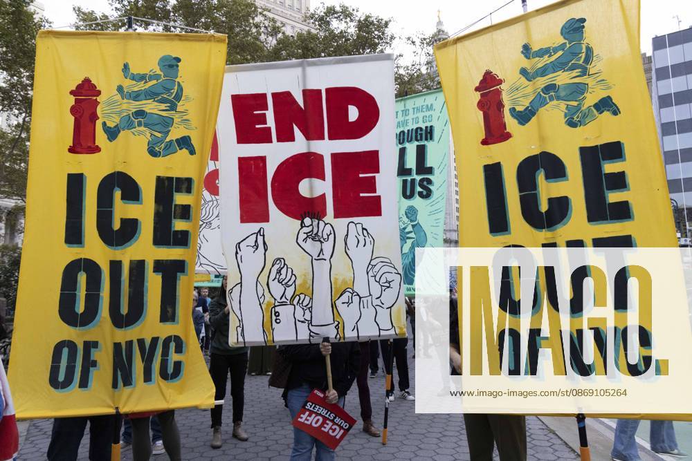 Demonstrators march through the streets of Lower Manhattan holding banners that read ICE OUT OF NYC END ICE at the Hands Off NYC coalition emergency protest demanding justice the day following ICE shooting a Bronx man while his 5 year child was in the car. New York USA - ZUMAr174 20261009_znp_r174_022