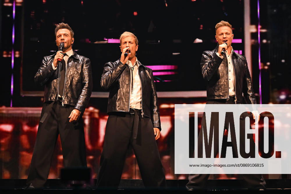 Westlife performing during the 25th Anniversary Tour LONDON, ENGLAND - OCTOBER 09: Shane Filan, Kian Egan and Nicky Byrne of ˜Westlife performing during the 25th Anniversary Tour at O2 Arena on October 09 in London, England. CAP MAR MAR Great Britain