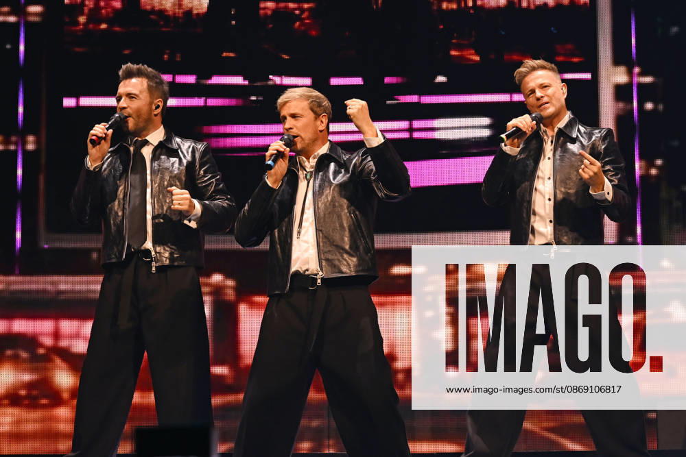 Westlife performing during the 25th Anniversary Tour LONDON, ENGLAND - OCTOBER 09: Shane Filan, Kian Egan and Nicky Byrne of ˜Westlife performing during the 25th Anniversary Tour at O2 Arena on October 09 in London, England. CAP MAR MAR Great Britain
