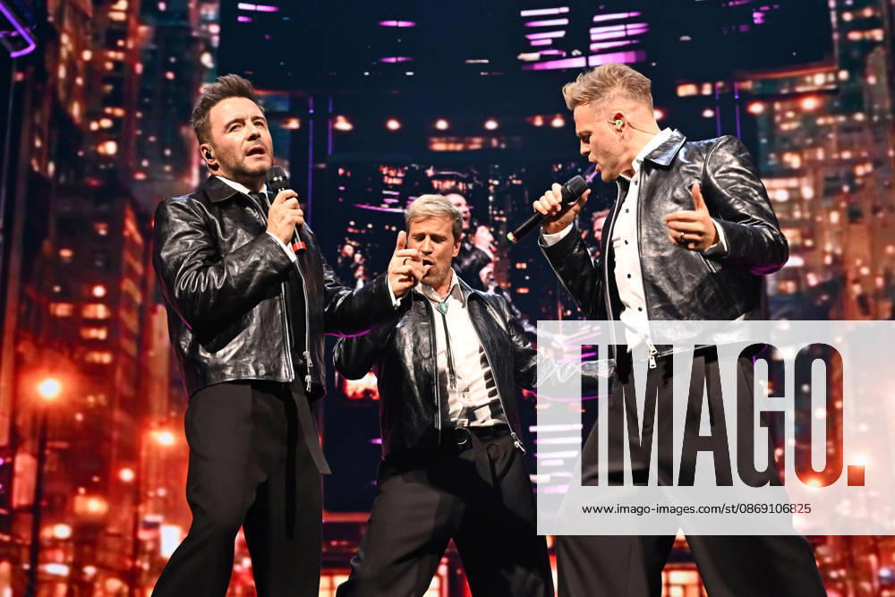 Westlife performing during the 25th Anniversary Tour LONDON, ENGLAND - OCTOBER 09: Shane Filan, Kian Egan and Nicky Byrne of ˜Westlife performing during the 25th Anniversary Tour at O2 Arena on October 09 in London, England. CAP MAR MAR Great Britain