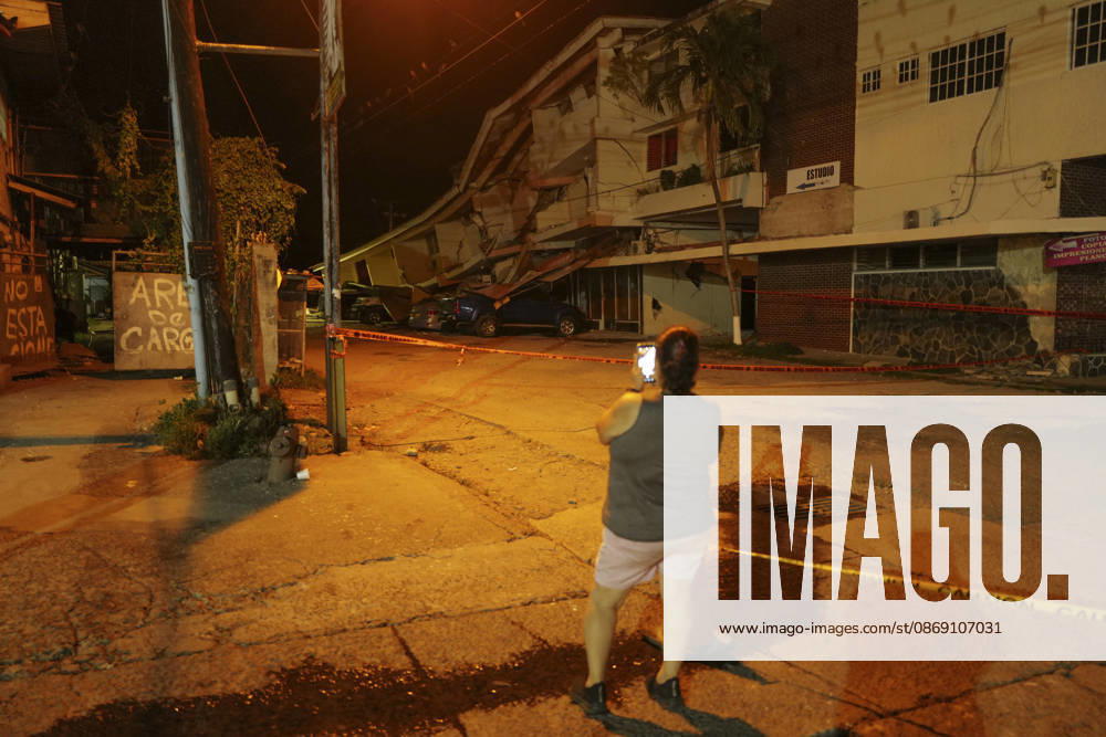 Strong 7.7 magnitude earthquake strikes Panama PENONOME, PANAMA - OCTOBER 9: A woman takes a picture of a collapsed building following the powerful 7.7 magnitude earthquake in Penonome, Panama, on October 9, 2026. A powerful 7.7-magnitude earthquake struck Panama on Friday, causing widespread power outages, severe structural damage, and panic among residents. Mauricio Valenzuela Anadolu Penonome Panama. Editorial use only. Please get in touch for any other usage.