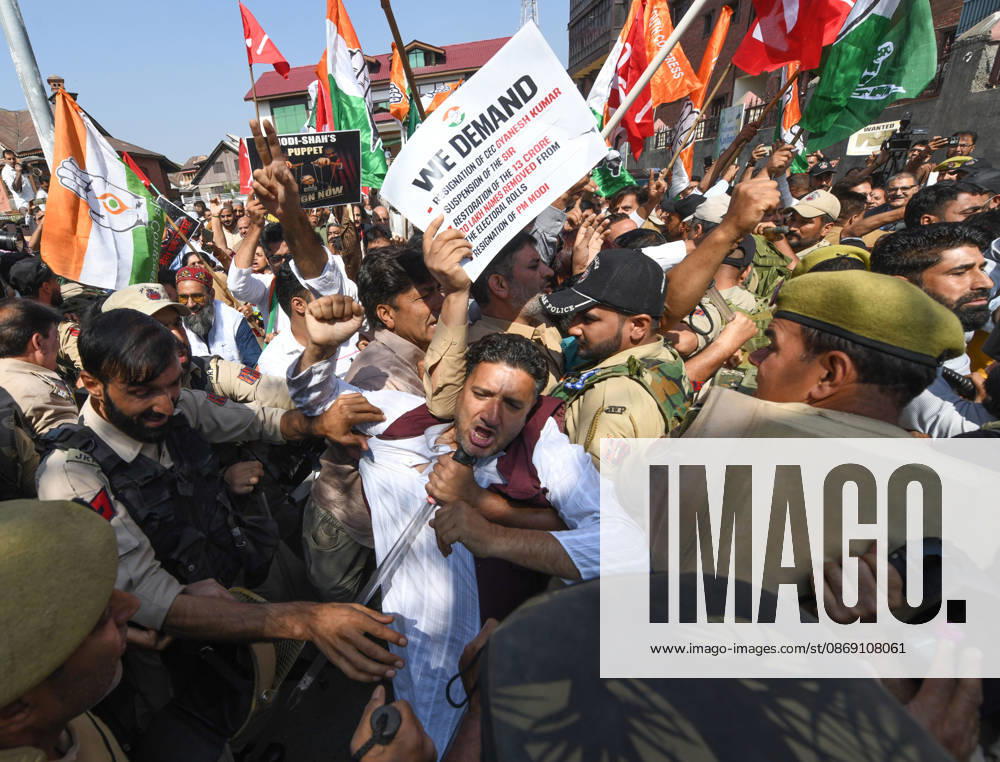 Police personnel try to stop supporters of the opposition alliance INDIA bloc (Indian National Developmental Inclusive Alliance) during a protest demanding the resignation of India s Chief Election Commissioner Gyanesh Kumar over alleged voter roll irregularities linked to the special intensive revision (SIR), in Srinagar on October 10, 2026. Srinagar India - ZUMAz120 20261010_zip_z120_010