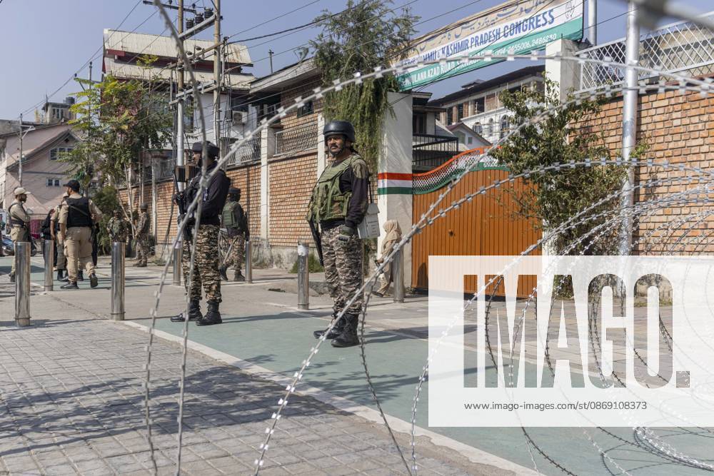 Security forces personnel stand guard outside Congress Bhawan as INDIA bloc alliance partners stage a protest under the Save Democracy Week and Vote Bachao, Desh Bachao campaign, amid row over the resignation of Chief Election Commissioner Gyanesh Kumar in Srinagar, the capital city of Indian Kashmir. Srinagar India - ZUMAf191 20261010_zip_f191_001