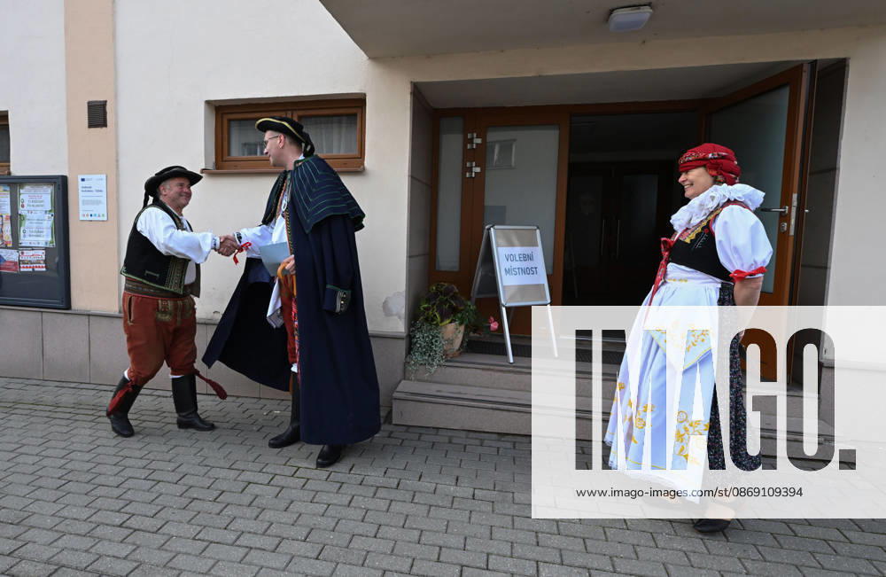 The two-day elections to municipal assemblies continued in the Czech Republic together with the first round of the elections to one-third of the Senate, on October 10, 2026. On the photo voters wearing traditional Hana folk costumes cast their ballots in Kozusany-Tazaly, in the Olomouc Region. (CTKxPhoto LudekxPerina) CTKPhotoP2026101001714 CTKPhotoP2026101001714