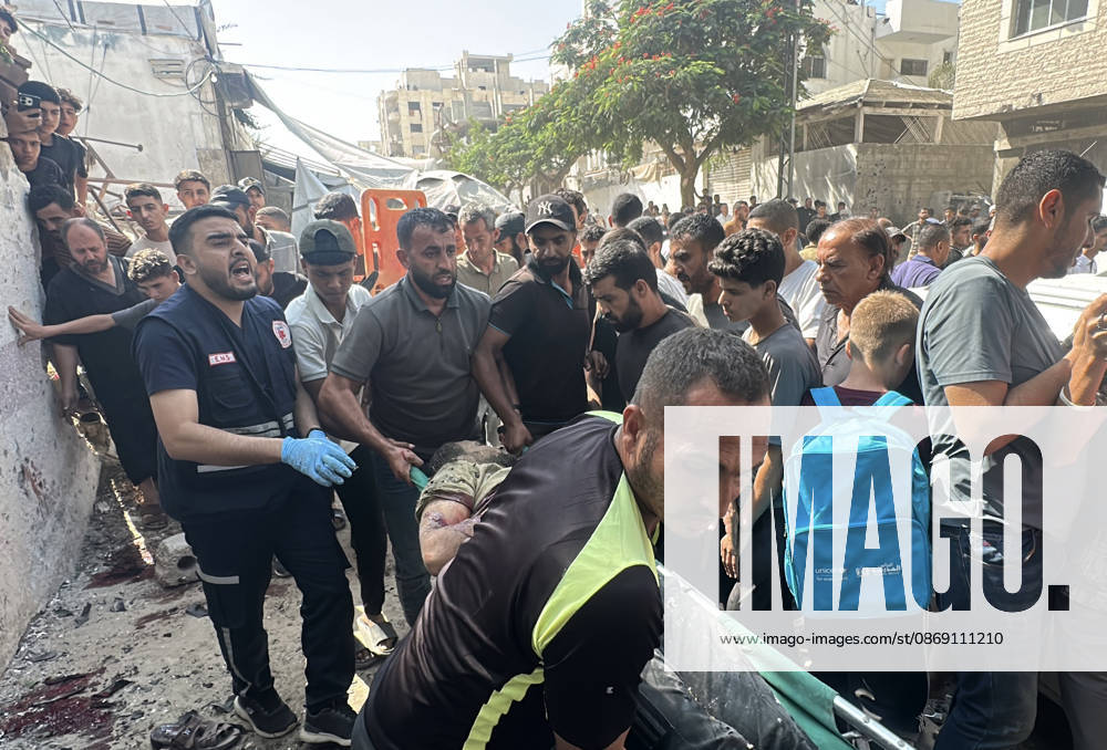 Palestinians Transport Dead and Wounded Following Israeli Airstrike in Gaza City Palestinians transport the bodies of people killed and others wounded to al-Shifa Hospital in Gaza City, on October 10, 2026, following an Israeli airstrike targeting a group of Palestinians in the western part of the city. Photo by Mohammed Salha apaimages Gaza Gaza Strip Palestinian Territory 101026_Gaza_MS_00(5)