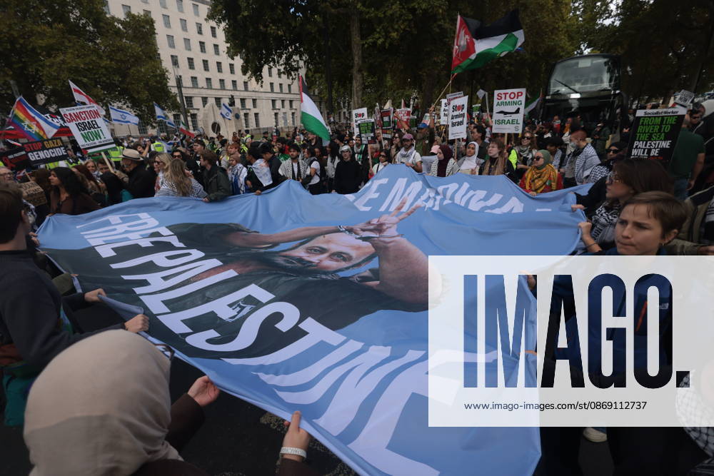 London, United Kingdom. Palestine Coalition Protest. Palestine Coalition protest march through London, with zionist counter protesters gathered outside New Scotland Yard.