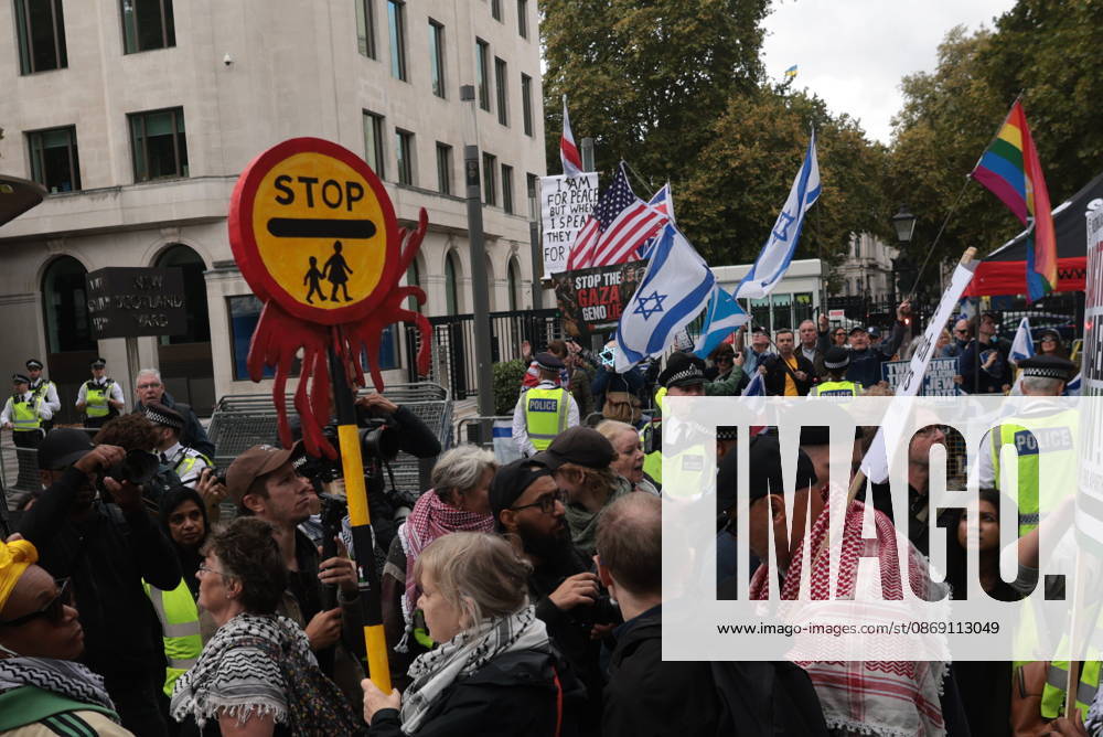 London, United Kingdom. Palestine Coalition Protest. Palestine Coalition protest march through London, with zionist counter protesters gathered outside New Scotland Yard.