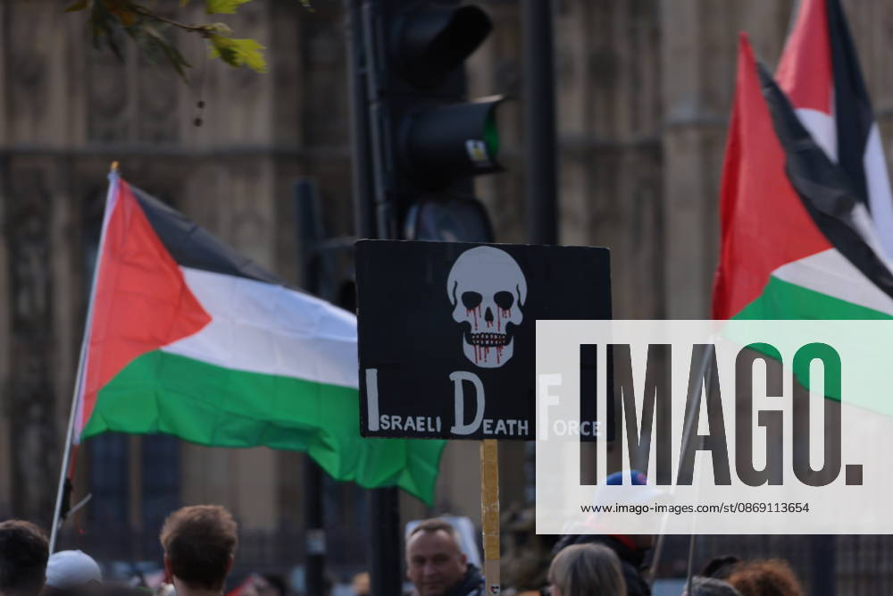 London, United Kingdom. Palestine Coalition Protest. Palestine Coalition protest march through London, with zionist counter protesters gathered outside New Scotland Yard.