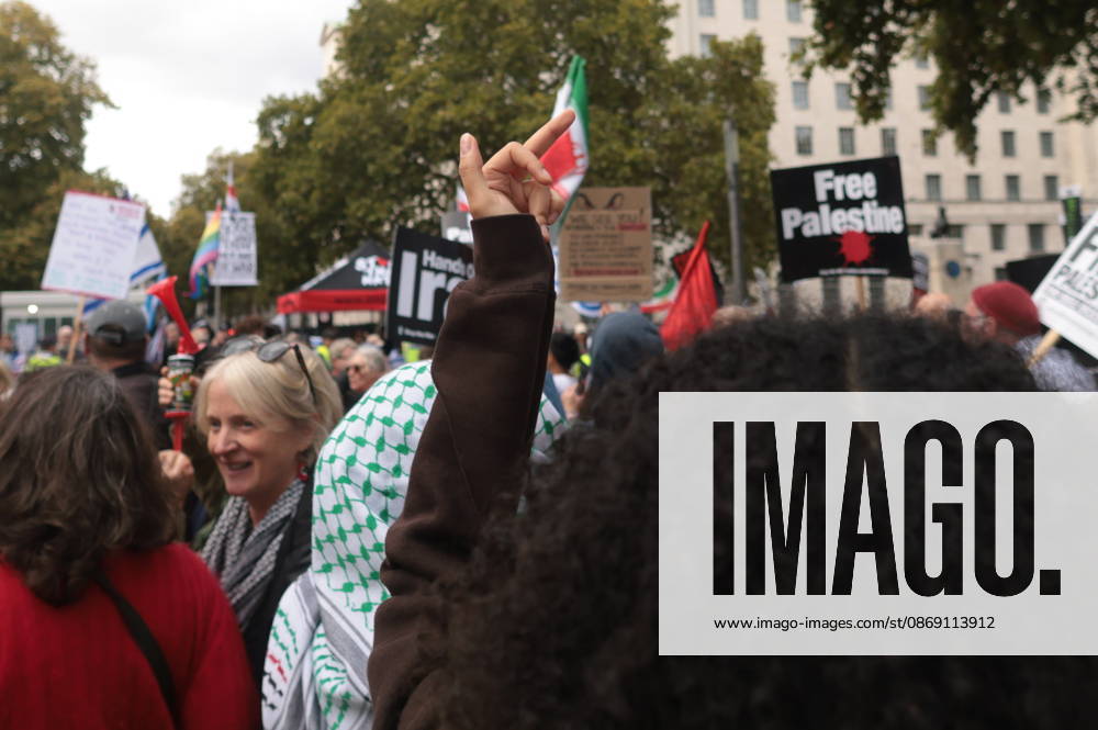 London, United Kingdom. Palestine Coalition Protest. Palestine Coalition protest march through London, with zionist counter protesters gathered outside New Scotland Yard.