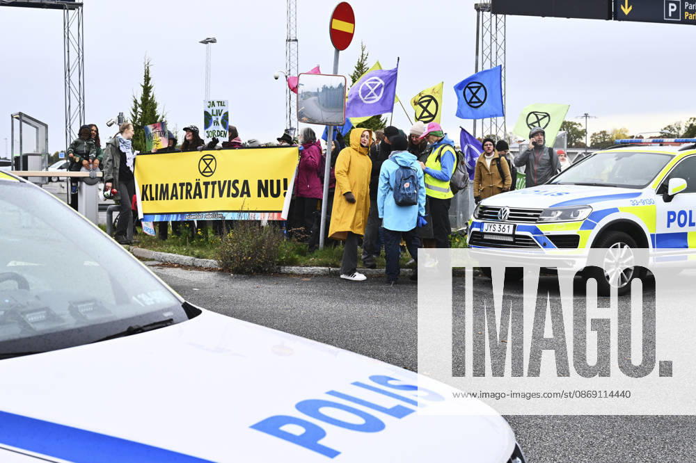 Climate activists outside Bromma Stockholm Airport; some climate activists have entered the airport and are staging protests, including on the runway, in Stockholm, Sweden, October 10, 2026 STOCKHOLM SWEDEN