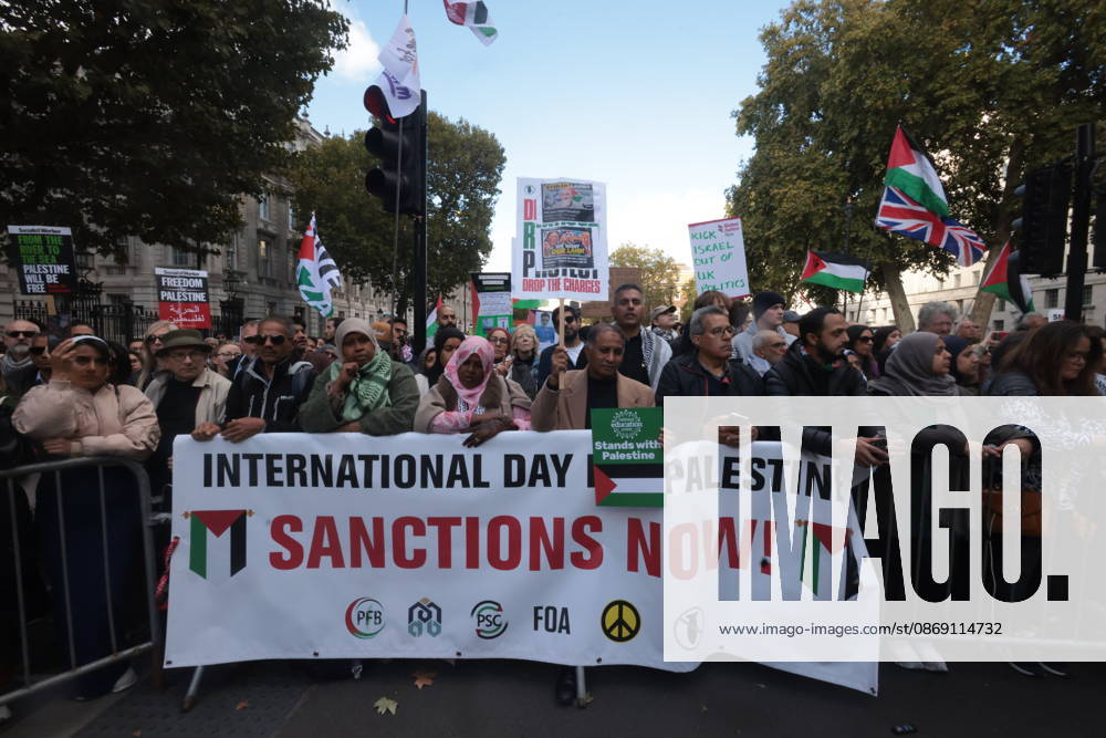 London, United Kingdom. Palestine Coalition Protest. Palestine Coalition protest march through London, with zionist counter protesters gathered outside New Scotland Yard.