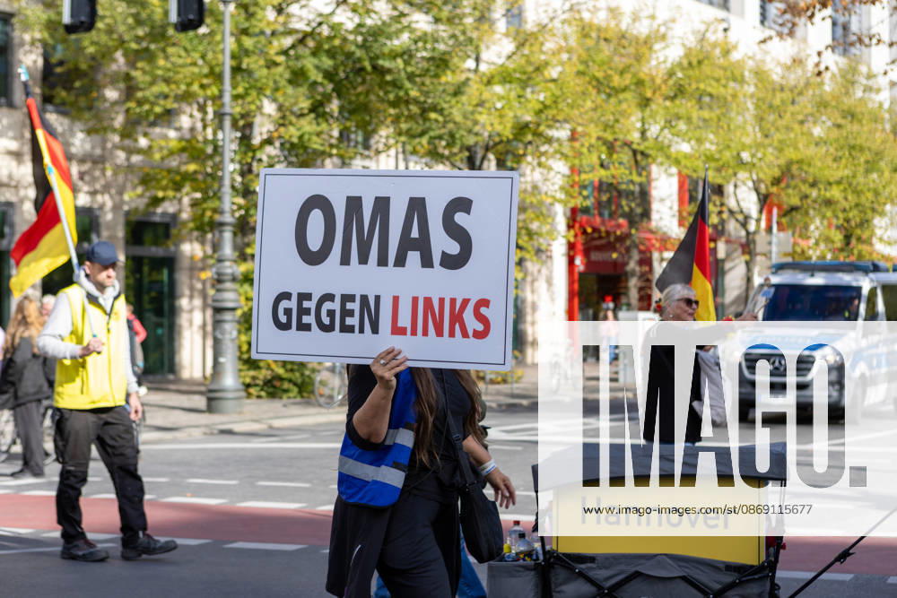 Demonstrators gather in Berlin for the Project M1llion rally against the German government. Participants take to the streets to voice their opposition to government policies, displaying banners and expressing their political demands. The demonstration brings together people seeking to make their concerns heard and draw public attention to their criticism of the country s political leadership. Berlin Germany - ZUMAc291 20261010_zip_c291_005