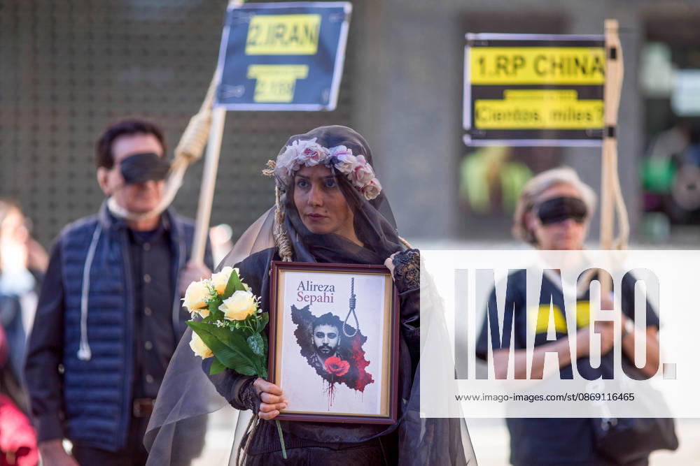 Protest in Madrid on the Day Against the Death Penalty - 10 Oct 2026 A woman holds a portrait with a veil on her head, during a rally against the death penalty in Callao Square in central Madrid. World Day Against the Death Penalty has been observed every October 10th since 2003. Madrid Spain