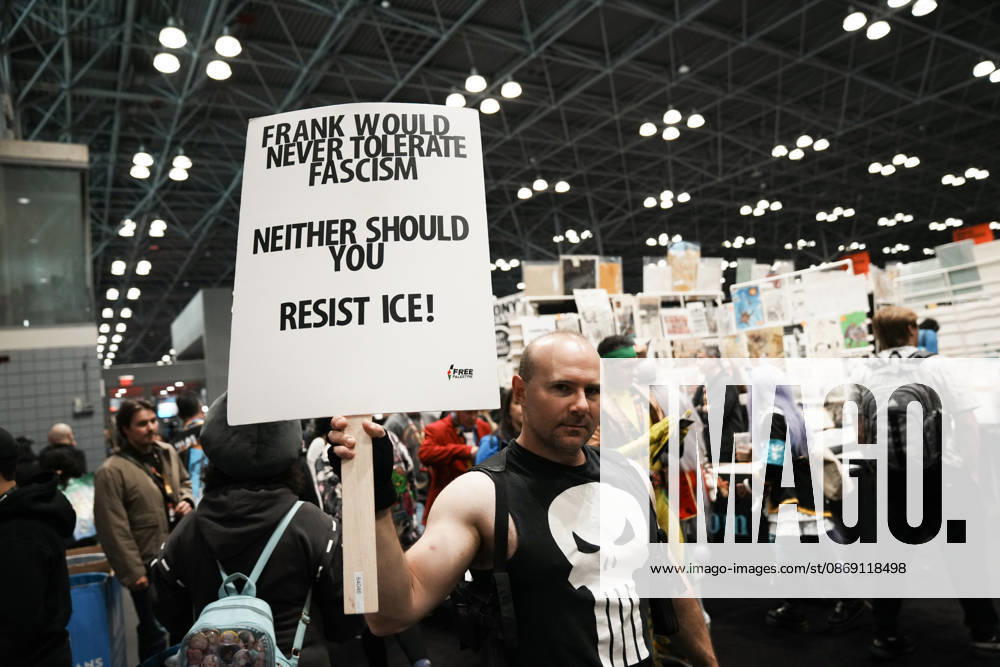 A fan of The Punisher holds an anti-fascism and anti-CE sign at the 2026 NY Comic Con at the Javits Center on October 10, 2026 in New York. New York USA - ZUMAb148 20261010_zap_b148_030