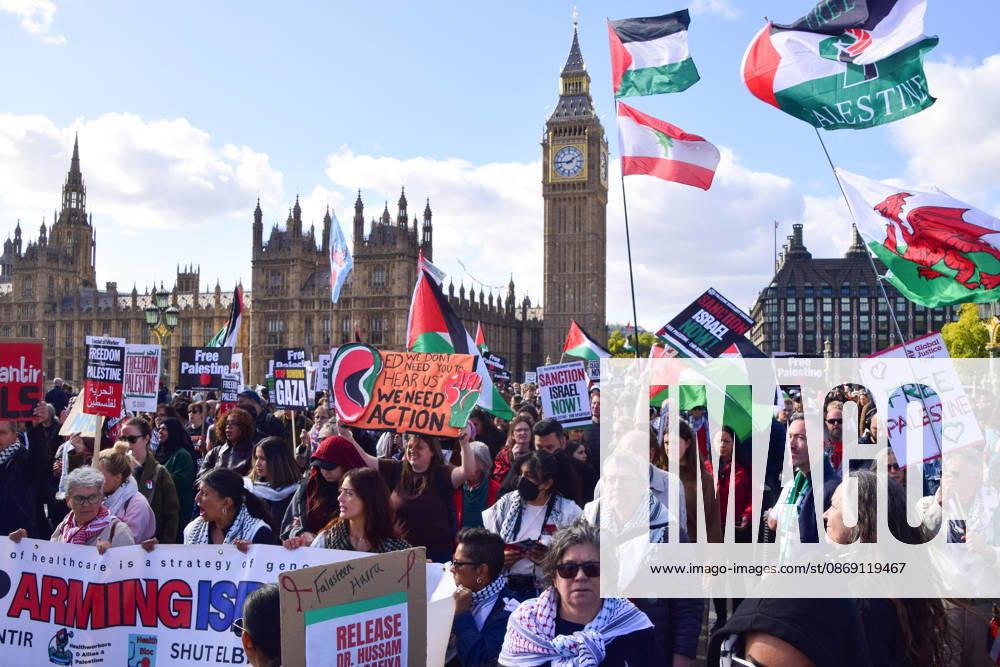 Protesters pass over Westminster Bridge past the Houses of Parliament as thousands of people march in support of Palestine. The protesters also called on the government to stop arming Israel and for sanctions on Israel. London United Kingdom - ZUMAv130 20261010_zip_v130_036