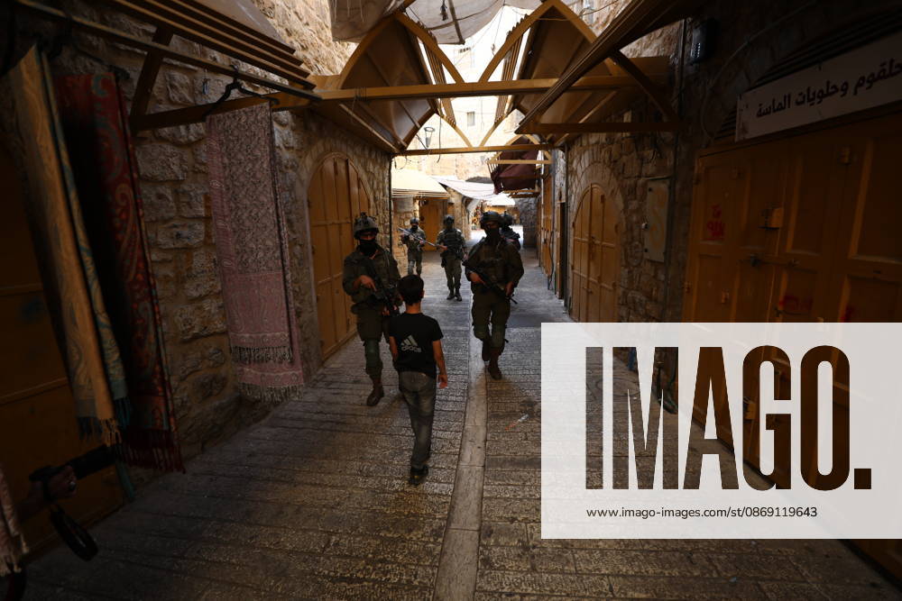 Jewish Settlers Enter Hebron s Old City Under Israeli Army Protection Jewish settlers enter the Old City of Hebron in the West Bank under the protection of Israeli army forces, on October 10, 2026. Photo by Mamoun Wazwaz apaimages Hebron West Bank Palestinian Territory 101026_Hebron_MW_00(12)