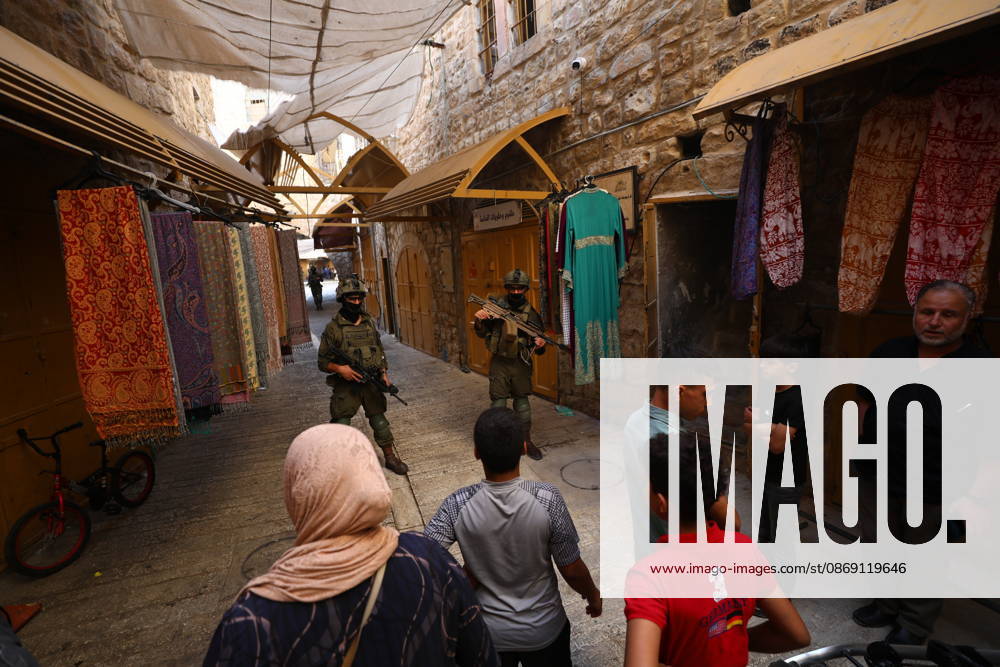 Jewish Settlers Enter Hebron s Old City Under Israeli Army Protection Jewish settlers enter the Old City of Hebron in the West Bank under the protection of Israeli army forces, on October 10, 2026. Photo by Mamoun Wazwaz apaimages Hebron West Bank Palestinian Territory 101026_Hebron_MW_00(14)