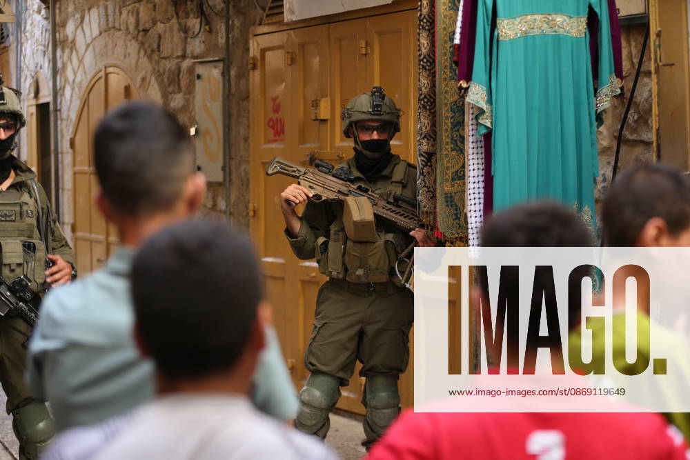 Jewish Settlers Enter Hebron s Old City Under Israeli Army Protection Jewish settlers enter the Old City of Hebron in the West Bank under the protection of Israeli army forces, on October 10, 2026. Photo by Mamoun Wazwaz apaimages Hebron West Bank Palestinian Territory 101026_Hebron_MW_00(17)