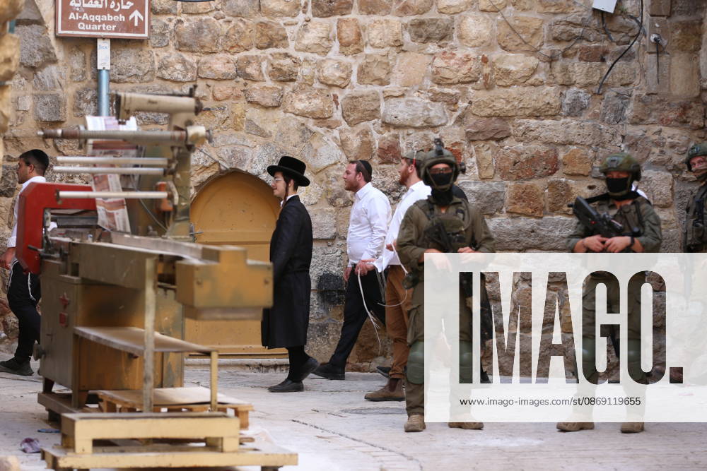 Jewish Settlers Enter Hebron s Old City Under Israeli Army Protection Jewish settlers enter the Old City of Hebron in the West Bank under the protection of Israeli army forces, on October 10, 2026. Photo by Mamoun Wazwaz apaimages Hebron West Bank Palestinian Territory 101026_Hebron_MW_00(22)