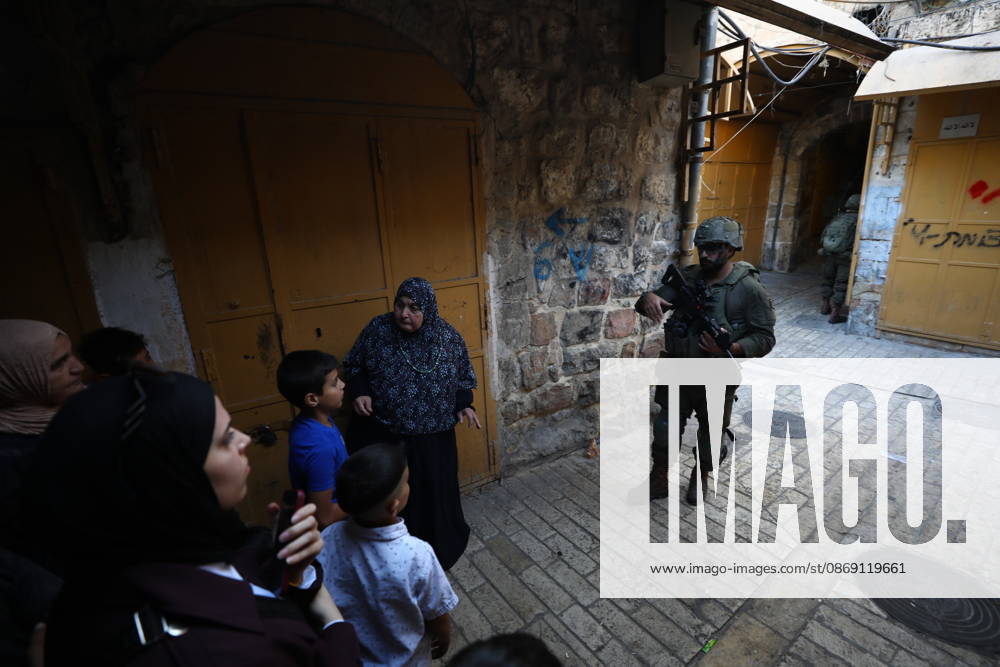 Jewish Settlers Enter Hebron s Old City Under Israeli Army Protection Jewish settlers enter the Old City of Hebron in the West Bank under the protection of Israeli army forces, on October 10, 2026. Photo by Mamoun Wazwaz apaimages Hebron West Bank Palestinian Territory 101026_Hebron_MW_00(28)