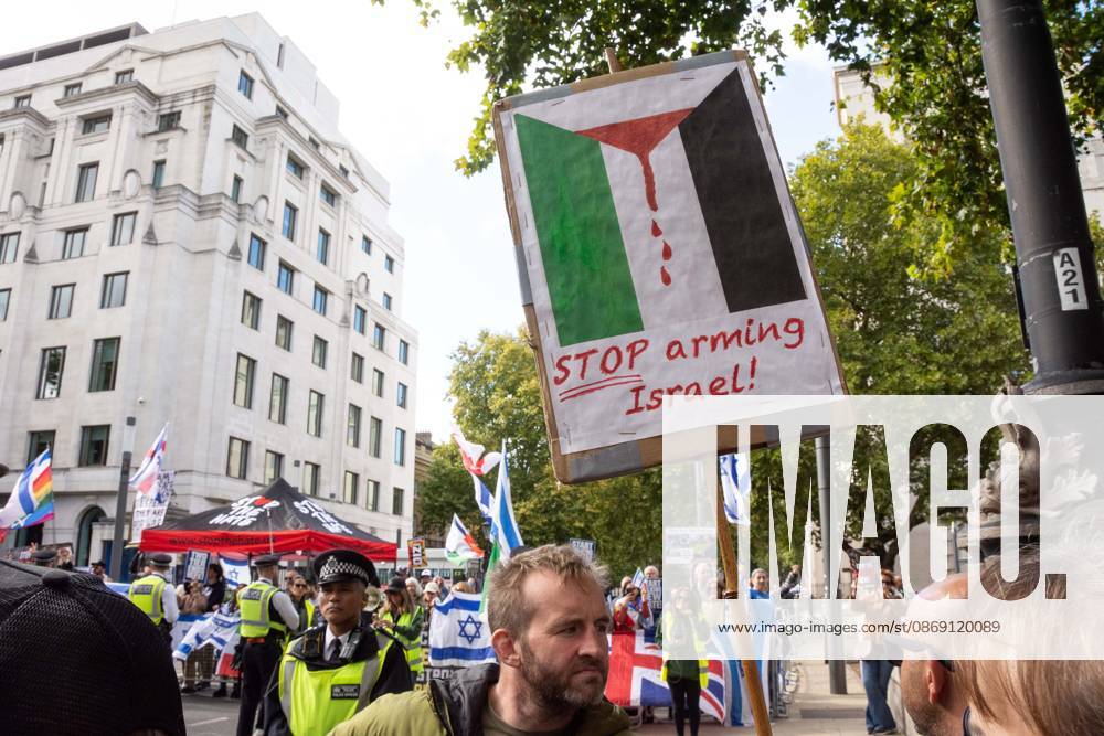 The National March for Palestine took place to mark the third anniversary of the start of the war in Gaza. Around ten thousand gathered on The Thames embankment and marched to Parliament Squre. They faced an Israeli counter demonstration of a handfull of protesters. Some arrests were reported by police. London England - ZUMAr169 20261010_zip_r169_012