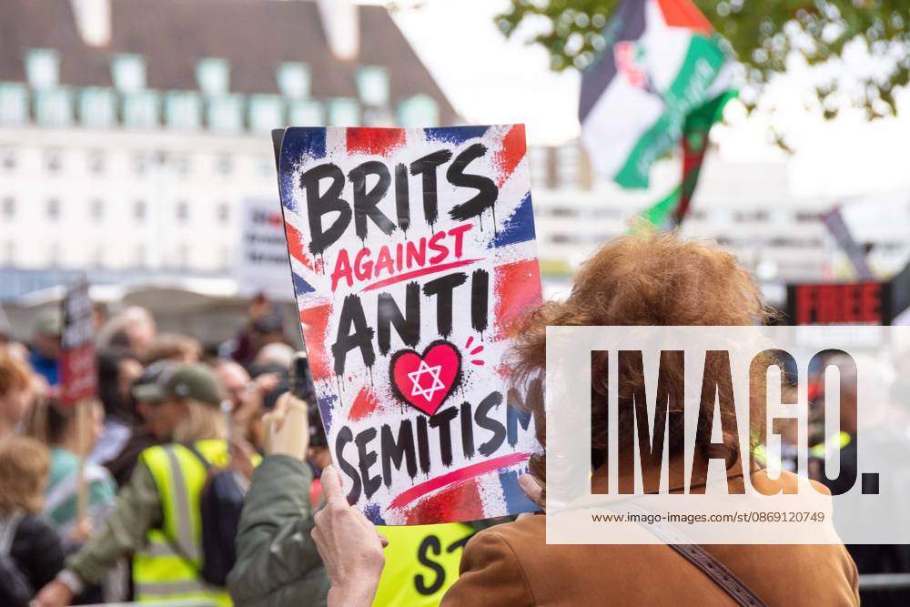 The National March for Palestine took place to mark the third anniversary of the start of the war in Gaza. Around ten thousand gathered on The Thames embankment and marched to Parliament Squre. They faced an Israeli counter demonstration of a handfull of protesters. Some arrests were reported by police. London England - ZUMAr169 20261010_zip_r169_010