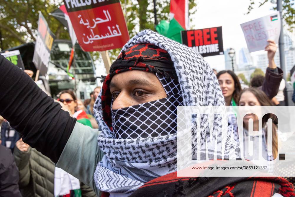 The National March for Palestine took place to mark the third anniversary of the start of the war in Gaza. Around ten thousand gathered on The Thames embankment and marched to Parliament Squre. They faced an Israeli counter demonstration of a handfull of protesters. Some arrests were reported by police. London England - ZUMAr169 20261010_zip_r169_016