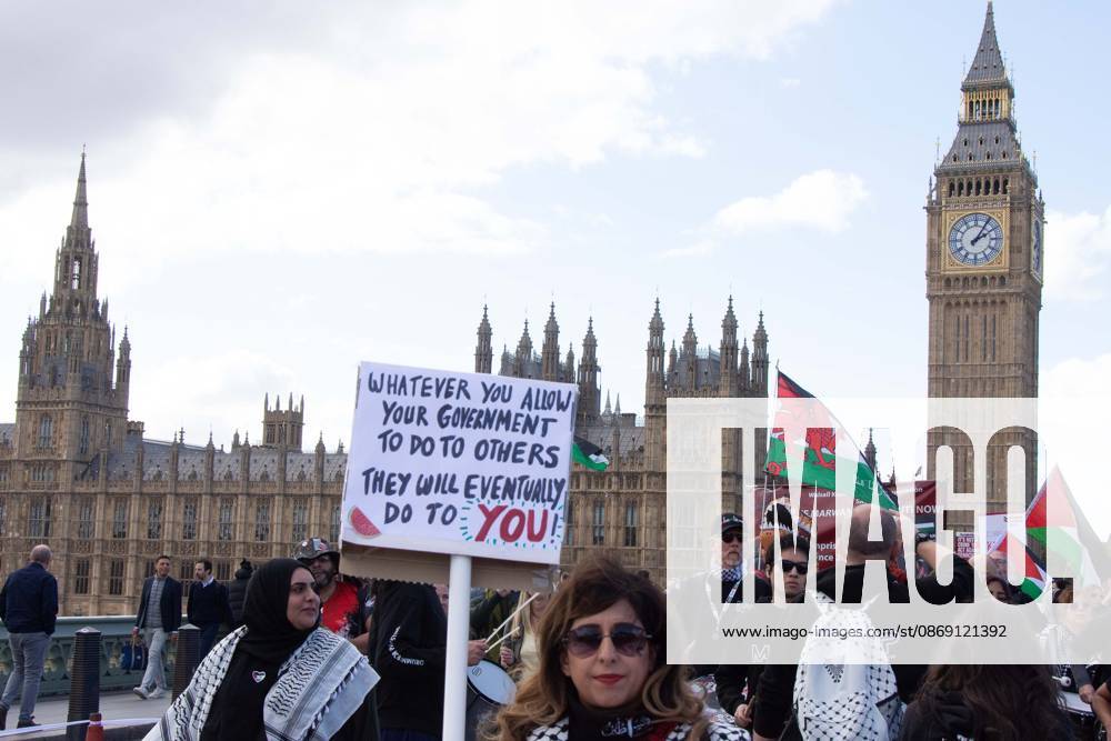 The National March for Palestine took place to mark the third anniversary of the start of the war in Gaza. Around ten thousand gathered on The Thames embankment and marched to Parliament Squre. They faced an Israeli counter demonstration of a handfull of protesters. Some arrests were reported by police. London England - ZUMAr169 20261010_zip_r169_043