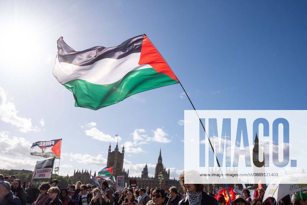 The National March for Palestine took place to mark the third anniversary of the start of the war in Gaza. Around ten thousand gathered on The Thames embankment and marched to Parliament Squre. They faced an Israeli counter demonstration of a handfull of protesters. Some arrests were reported by police. London England - ZUMAr169 20261010_zip_r169_048