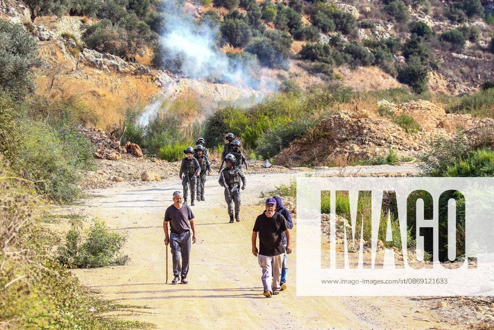 DEIR ABU MASHÃ¢â‚¬â ¢AL, PALESTINE Ã¢â‚¬ OCTOBER 10, 2026: Palestinian farmers came under attack by Israeli settlers and Israeli forces as they headed to harvest olives on their land in Deir Abu MashÃ¢â‚¬â ¢al, northwest of Ramallah. The event marked the villageÃ¢â‚¬â ¢s first olive harvest gathering of the new season. The Palestine Red Crescent Society reported that its teams treated nine people injured during the incident. The injuries included one caused by live ammunition to the thigh, two caused by rubber-coated metal bullets, and six resulting from physical assault. One of those struck by a rubber-coated metal bullet was photojournalist Issam Al-Rimawi. The incident occurred during the annual olive harve - ZUMAq101 20261010_zna_q101_060