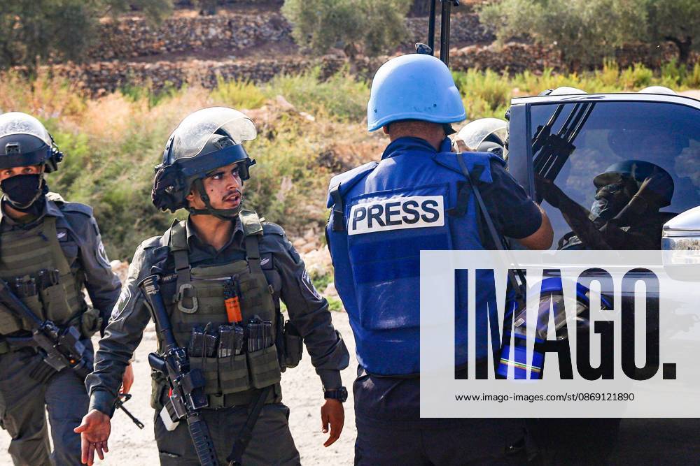 DEIR ABU MASHÃ¢â‚¬â ¢AL, PALESTINE Ã¢â‚¬ OCTOBER 10, 2026: Palestinian farmers came under attack by Israeli settlers and Israeli forces as they headed to harvest olives on their land in Deir Abu MashÃ¢â‚¬â ¢al, northwest of Ramallah. The event marked the villageÃ¢â‚¬â ¢s first olive harvest gathering of the new season. The Palestine Red Crescent Society reported that its teams treated nine people injured during the incident. The injuries included one caused by live ammunition to the thigh, two caused by rubber-coated metal bullets, and six resulting from physical assault. One of those struck by a rubber-coated metal bullet was photojournalist Issam Al-Rimawi. The incident occurred during the annual olive harve - ZUMAq101 20261010_zna_q101_083