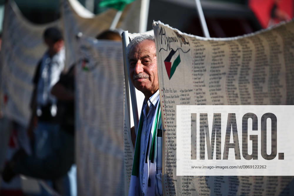 An elderly man stands among banners bearing the names of Palestinians killed in Gaza during a pro-Palestinian demonstration. Athens GREECE - ZUMAx103 20261010_zip_x103_020