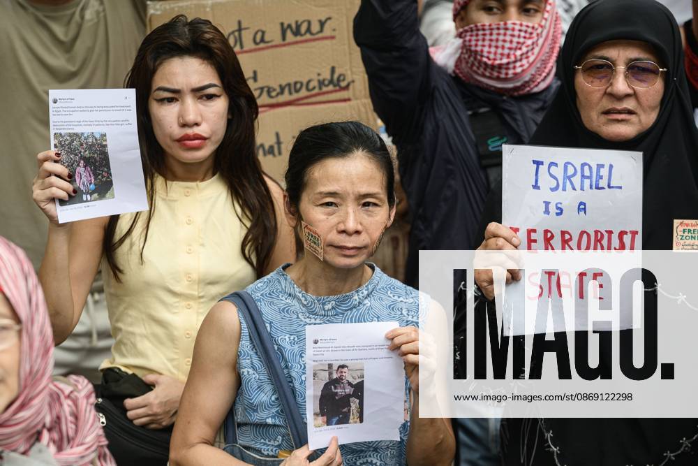 Pro-Palestinian protesters rally in Bangkok BANGKOK, THAILAND, OCTOBER 10, 2026: Pro-Palestinian demonstrators gather outside the Israeli Embassy in Bangkok during a protest marking 1,100 days since the start of the war in Gaza. Participants held portraits of Palestinians killed during the conflict for three minutes in an action titled Every Life Isn t Just a Number, symbolizing three years of war. The demonstration was held as part of a Global Action Day for Palestine. Bangkok Thailand