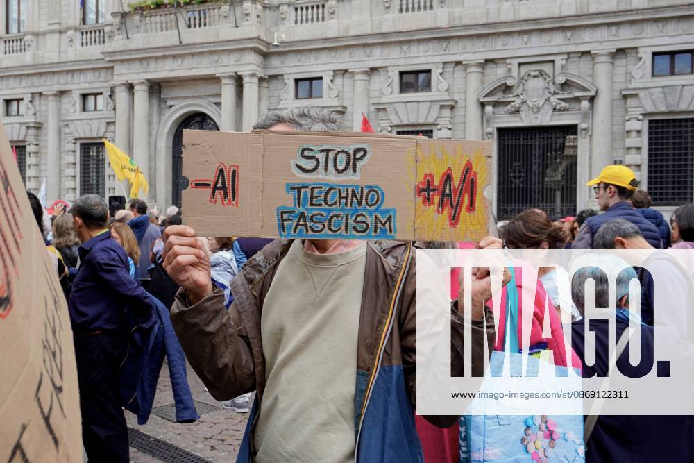 Protesters demand moratorium on new data centers in Milan MILAN, ITALY OCTOBER 10, 2026: Protesters gather for a sit-in in Piazza della Scala in central Milan to oppose the development of new data centers across Lombardy and Italy. The demonstration is organized by the Rete dei Comitati No Data Center (No Data Center Committee Network), which is calling for a moratorium on permits for new facilities. The group also urges public authorities to conduct thorough environmental, urban planning and regional assessments before approving projects. For approved facilities that have not yet begun operating, campaigners are calling for reviews to be reopened if potential microclimate effects and cumulative impacts with existing facilities were not
