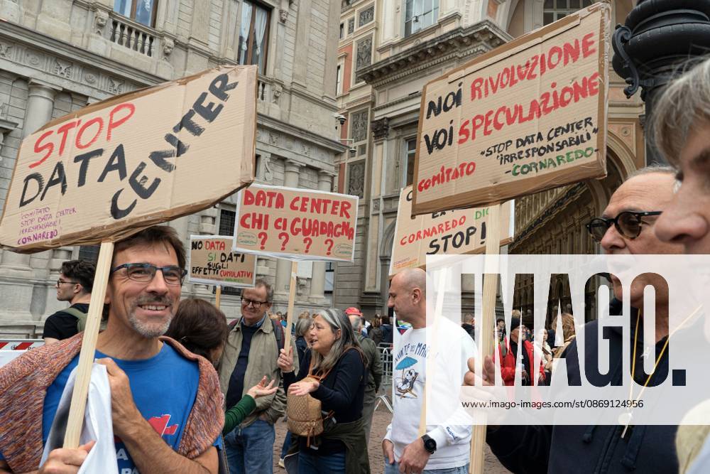 MILAN, ITALY Ã¢â‚¬ OCTOBER 10, 2026: Protesters gather for a sit-in in Piazza della Scala in central Milan to oppose the development of new data centers across Lombardy and Italy. The demonstration is organized by the Rete dei Comitati No Data Center (No Data Center Committee Network), which is calling for a moratorium on permits for new facilities. The group also urges public authorities to conduct thorough environmental, urban planning and regional assessments before approving projects. For approved facilities that have not yet begun operating, campaigners are calling for reviews to be reopened if potential microclimate effects and cumulative impacts with existing facilities were not adequately assessed. - ZUMAq101 20261007_zna_q101_447