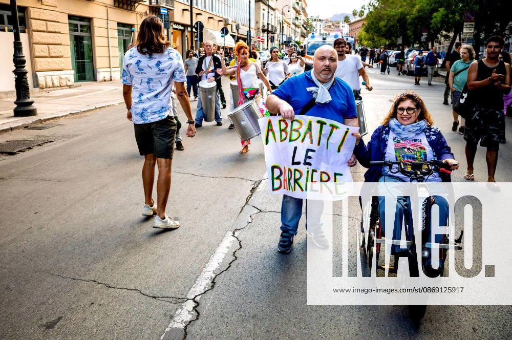 Disability Pride Palermo 2026 PALERMO, ITALY - OCTOBER 10: Disability Pride Palermo, dedicated this year to the theme Revolutionary Disabilities to advocate for the rights and self-determination of people with disabilities and to demand the elimination of architectural barriers, sign that read: Break down the barriers, on October 10, 2026 in Palermo, Italy. Palermo Sicily Italy