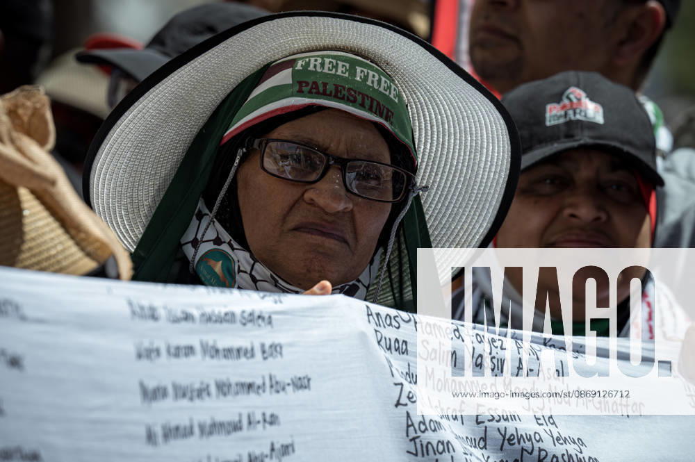 Pro-Palestine Global Mass March in Cape Town A pro-Palestinian demonstrator holds part of a twenty metre shroud bearing the names of over 20,000 Palestinian children killed in Gaza, during a mass protest in Cape Town, South Africa, 10 October 2026. Thousands of people marched through central Cape Town as part of a coordinated Global Day of Action for Palestine. More than 200 organisations mobilised demonstrations across at least 60 countries and 250 locations, marking three years since the start of Israels military campaign in Gaza. Cape Town was the centre of the African leg, with 32 actions across 10 countries. Cape Town South Africa