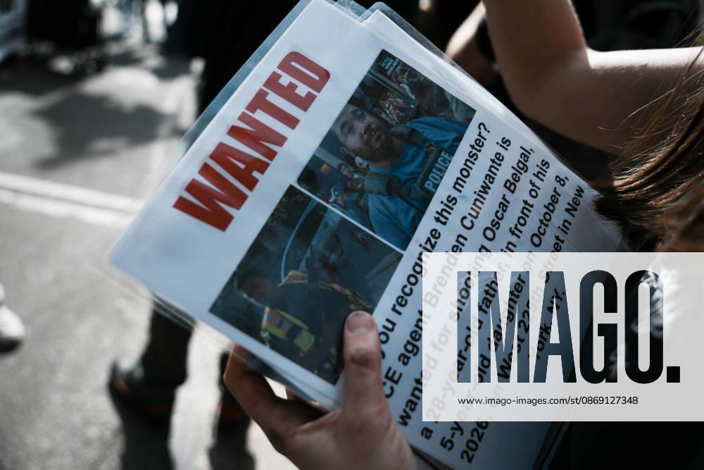 A protester holds a Wanted Sign with ICE Agent Brendan Cuni , accused of shooting Oscar Belgal, on a sign at an anti-ICE protest near Union Square on October 10, 2026 in New York City. Protesters take to the streets following an incident where ICE agents shot a 28-year-old-man, Oscar Belgal while he in a vehicle with his 5-year old child in the Marble Hill neighborhood in the Bronx. New York USA - ZUMAb148 20261010_zap_b148_039