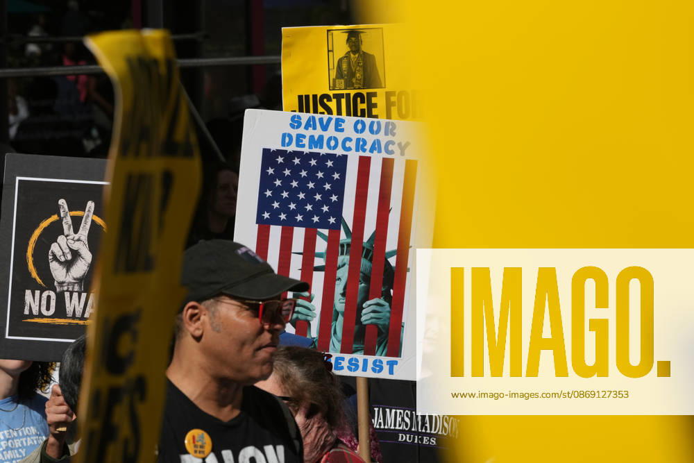Protesters at an anti-ICE protest in Herald Square on October 10, 2026 in New York City. Protesters take to the streets following an incident where ICE agents shot a 28-year-old-man, Oscar Belgal while he in a vehicle with his 5-year old child in the Marble Hill neighborhood in the Bronx. New York USA - ZUMAb148 20261010_zap_b148_046