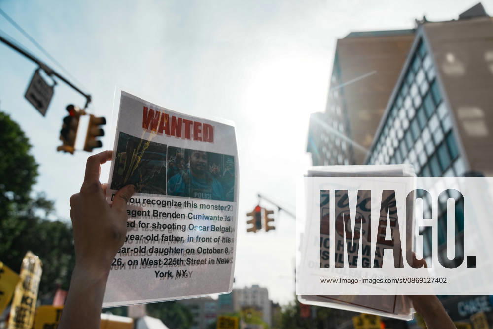 A protester holds a Wanted Sign with ICE Agent Brendan Cuni , accused of shooting Oscar Belgal, on a sign at an anti-ICE protest near Union Square on October 10, 2026 in New York City. Protesters take to the streets following an incident where ICE agents shot a 28-year-old-man, Oscar Belgal while he in a vehicle with his 5-year old child in the Marble Hill neighborhood in the Bronx. New York USA - ZUMAb148 20261010_zap_b148_055