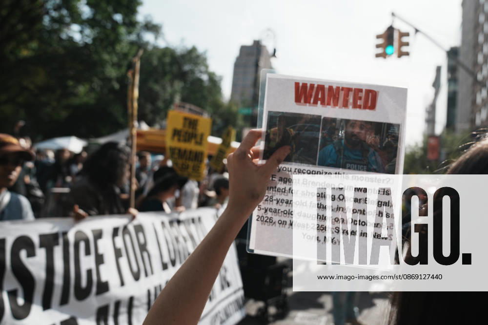 A protester holds a Wanted Sign with ICE Agent Brendan Cuni , accused of shooting Oscar Belgal, on a sign at an anti-ICE protest near Union Square on October 10, 2026 in New York City. Protesters take to the streets following an incident where ICE agents shot a 28-year-old-man, Oscar Belgal while he in a vehicle with his 5-year old child in the Marble Hill neighborhood in the Bronx. New York USA - ZUMAb148 20261010_zap_b148_056