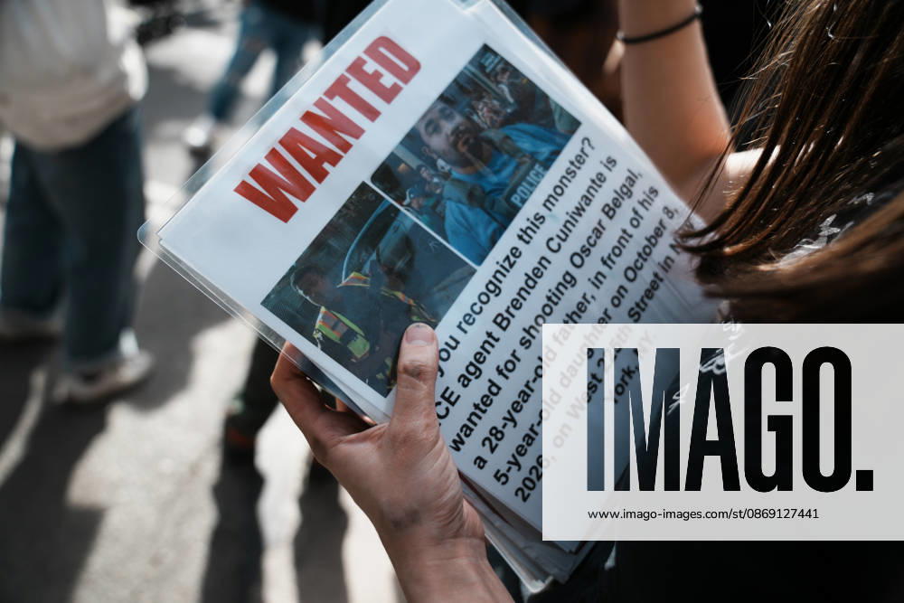 A protester holds a Wanted Sign with ICE Agent Brendan Cuni , accused of shooting Oscar Belgal, on a sign at an anti-ICE protest near Union Square on October 10, 2026 in New York City. Protesters take to the streets following an incident where ICE agents shot a 28-year-old-man, Oscar Belgal while he in a vehicle with his 5-year old child in the Marble Hill neighborhood in the Bronx. New York USA - ZUMAb148 20261010_zap_b148_057