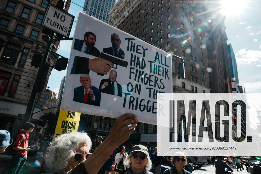 Protesters at an anti-ICE protest in Herald Square on October 10, 2026 in New York City. Protesters take to the streets following an incident where ICE agents shot a 28-year-old-man, Oscar Belgal while he in a vehicle with his 5-year old child in the Marble Hill neighborhood in the Bronx. New York USA - ZUMAb148 20261010_zap_b148_058