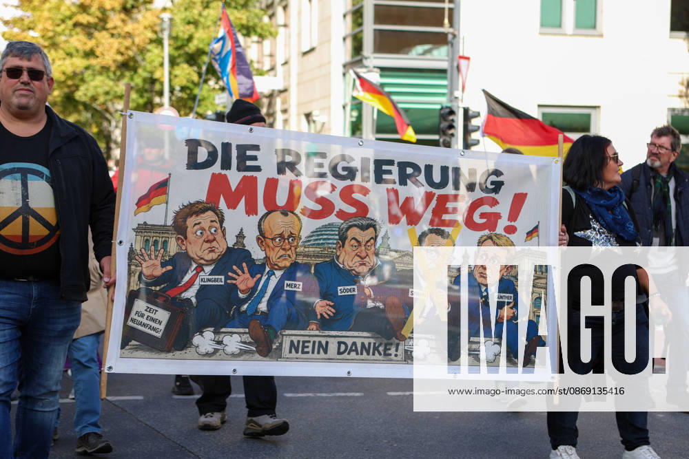 Demonstrators gather in Berlin for the Project M1llion rally against the German government. Participants take to the streets to voice their opposition to government policies, displaying banners and expressing their political demands. The demonstration brings together people seeking to make their concerns heard and draw public attention to their criticism of the country s political leadership. Berlin Germany - ZUMAc291 20261010_zip_c291_010