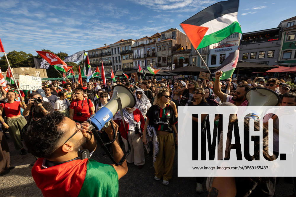 Palestine Solidarity March in Porto - 10 Oct 2026 Participants carrying Palestinian flags and placards gather at Praça dos Poveiros at the beginning of a Palestine solidarity march. Hundreds of demonstrators gathered in Porto for a Palestine solidarity march calling for an end to the war in Gaza and support for Palestinian rights. The march began at Praça dos Poveiros and concluded at Praça D. João I. Porto Portugal