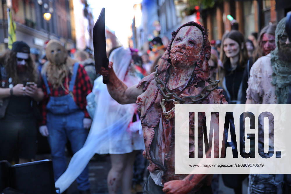 World Zombie Day In London, UK - 10 Oct 2026 A participant dressed as a zombie with a large meat cleaver walks the streets of Soho during the celebration. Supporters of World Zombie Day dressed in their best zombie attire and took to the streets and open spaces of London’s Soho district. The event started in the United States in 2006 and raises money through donations for charities like The Dead Good Club that helps people keep abreast of fast changing technologies like AI and digital media. London United Kingdom
