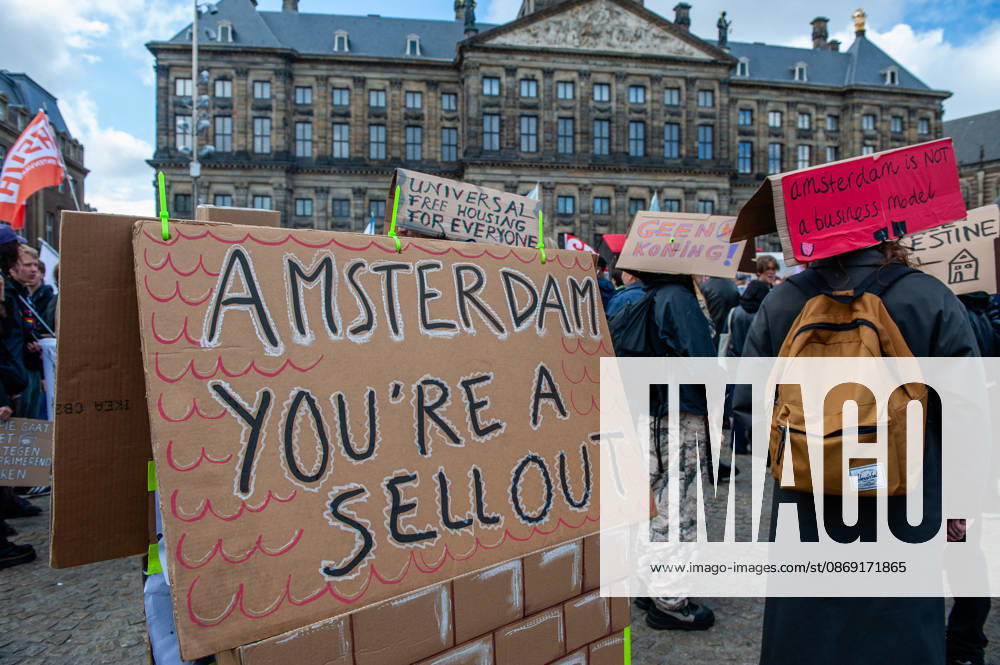 A cardboard house is showing how sell-out Amsterdam is during the demonstration. People gathered against the worsening housing crisis. Under the motto Houses for people, not for profit, they demand fundamental changes in Dutch public housing. Amsterdam Netherlands - ZUMAs197 20261010_aaa_s197_541