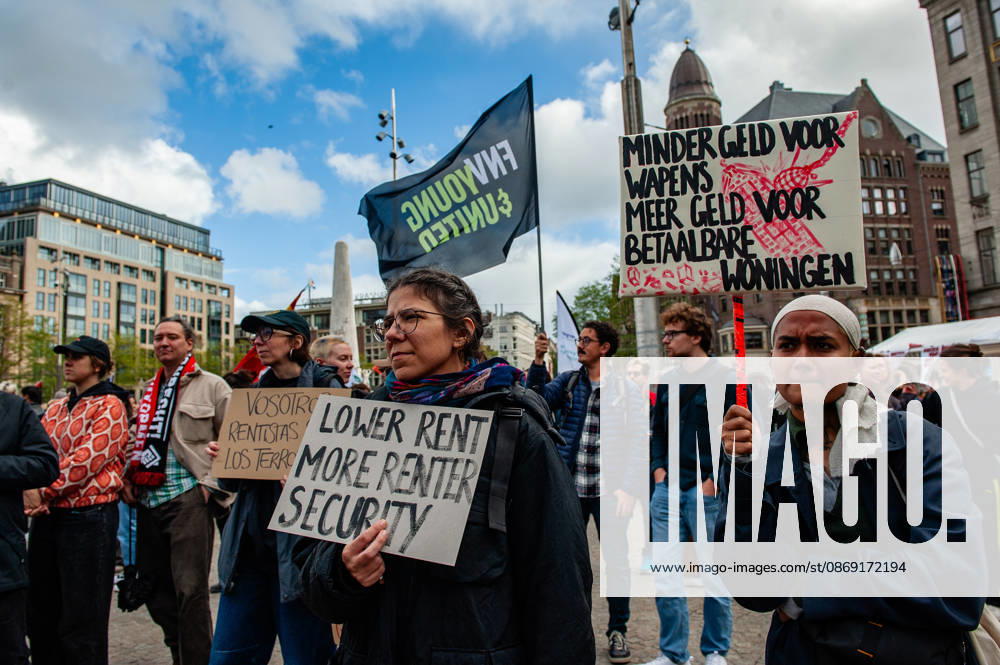 Protesters are holding placards asking for more money for housing during the demonstration. People gathered against the worsening housing crisis. Under the motto Houses for people, not for profit, they demand fundamental changes in Dutch public housing. Amsterdam Netherlands - ZUMAs197 20261010_aaa_s197_558