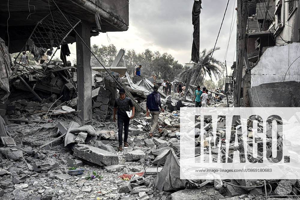 Palestinians Inspect Damage After Strike in Deir al-Balah Palestinians inspect their belongings amid the rubble of damaged residential buildings and their displacement tents after an Israeli airstrike targeted a house in Deir al-Balah, in the central Gaza Strip, on October 11, 2026. Photo by Ahmed Ibrahim apaimages Deir al-Balah Gaza Palestinian Territory 111026_Deir_al-Balah_AI_00(1)